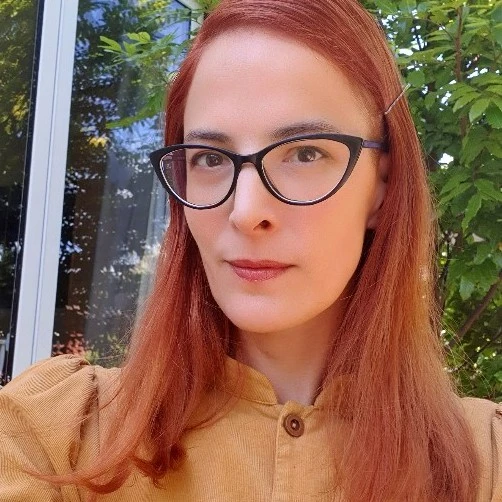 Headshot of Suraya Casey, Copywriter and Content Designer